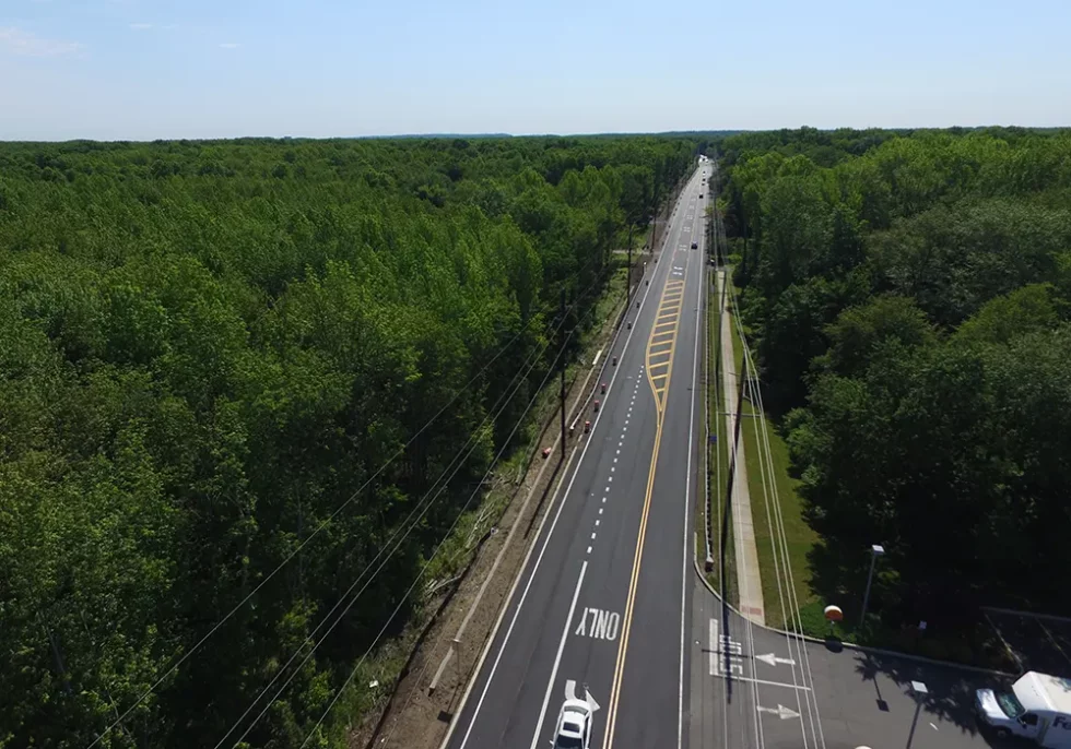 Aerial view of the nearly completed Woodhaven Texas Road project, highlighting Renda Roads' asphalt mastery in New Jersey.
